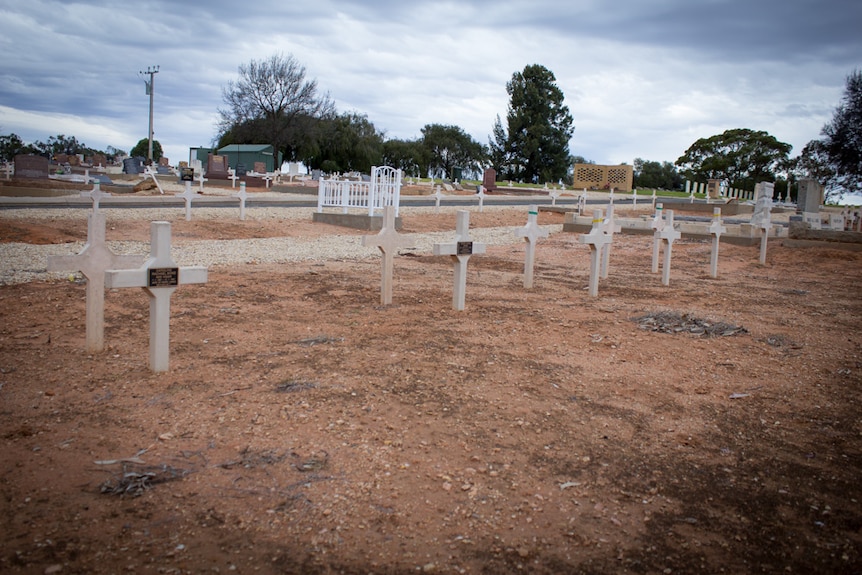 Row of unmarked graves