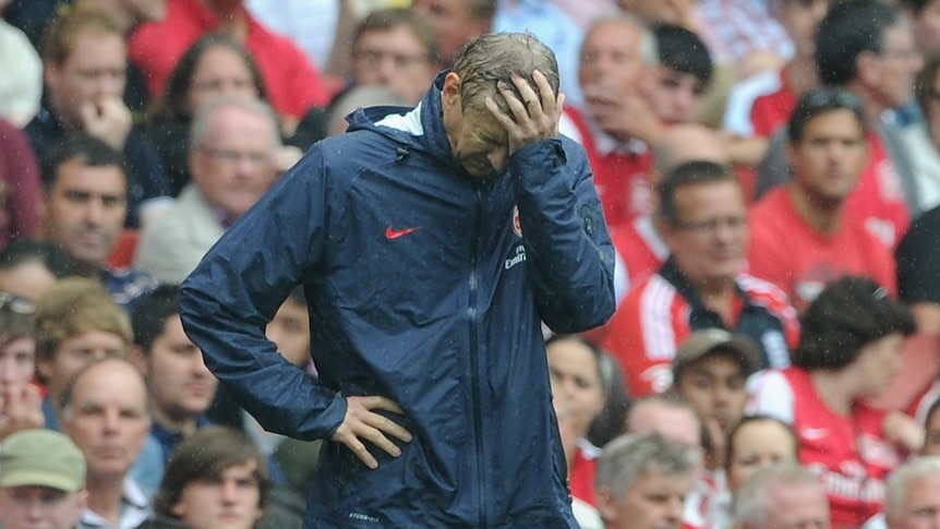 Wenger shows his dejection
