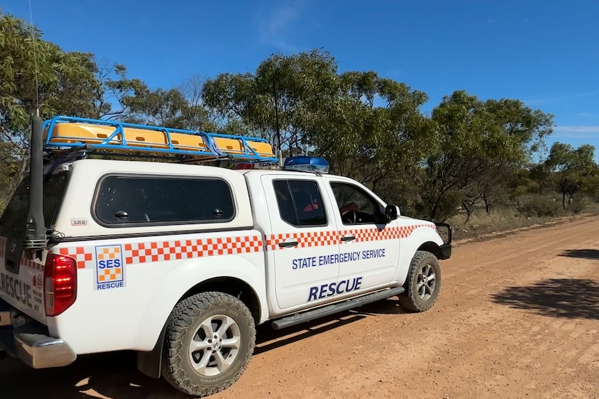 A South Australian State Emergency Service vehicle on a dirt road.