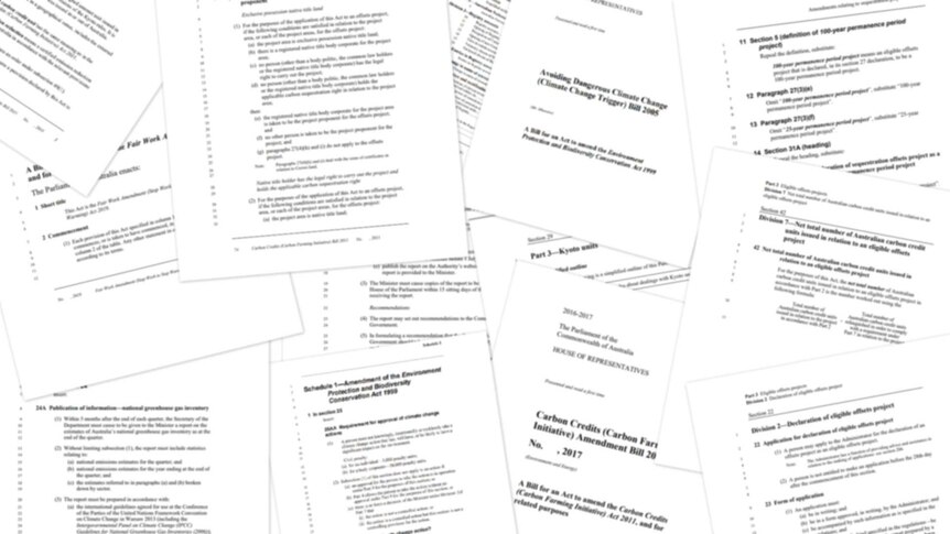 A collage of bills relating to climate change, though slightly blurred to give the text prominence.