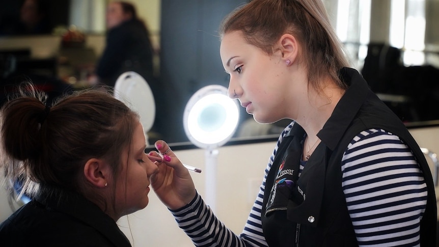 Jordan River Learning Federation Senior School student Mackenzie George applying makeup, August 2019