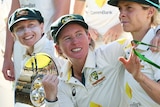 Alyssa Healy, Beth Mooney and Sophie Molineux celebrate after beating South Africa in the Test at the WACA.