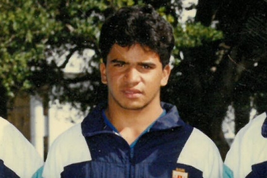 A photograph of a young Stephen Smith Jnr wearing a sports jacket.