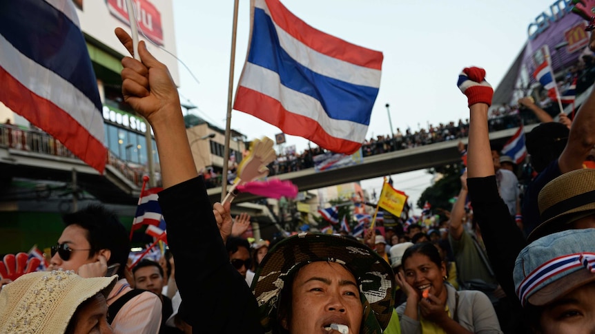 Protestors wave flags in Thailand