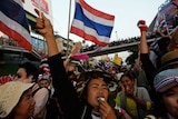 Protesters wave flags in Thailand