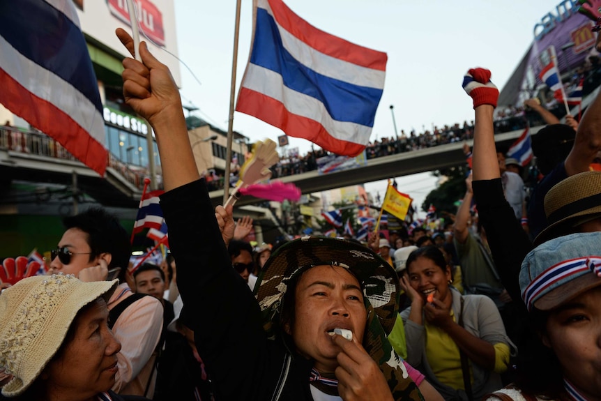 Protestors wave flags in Thailand