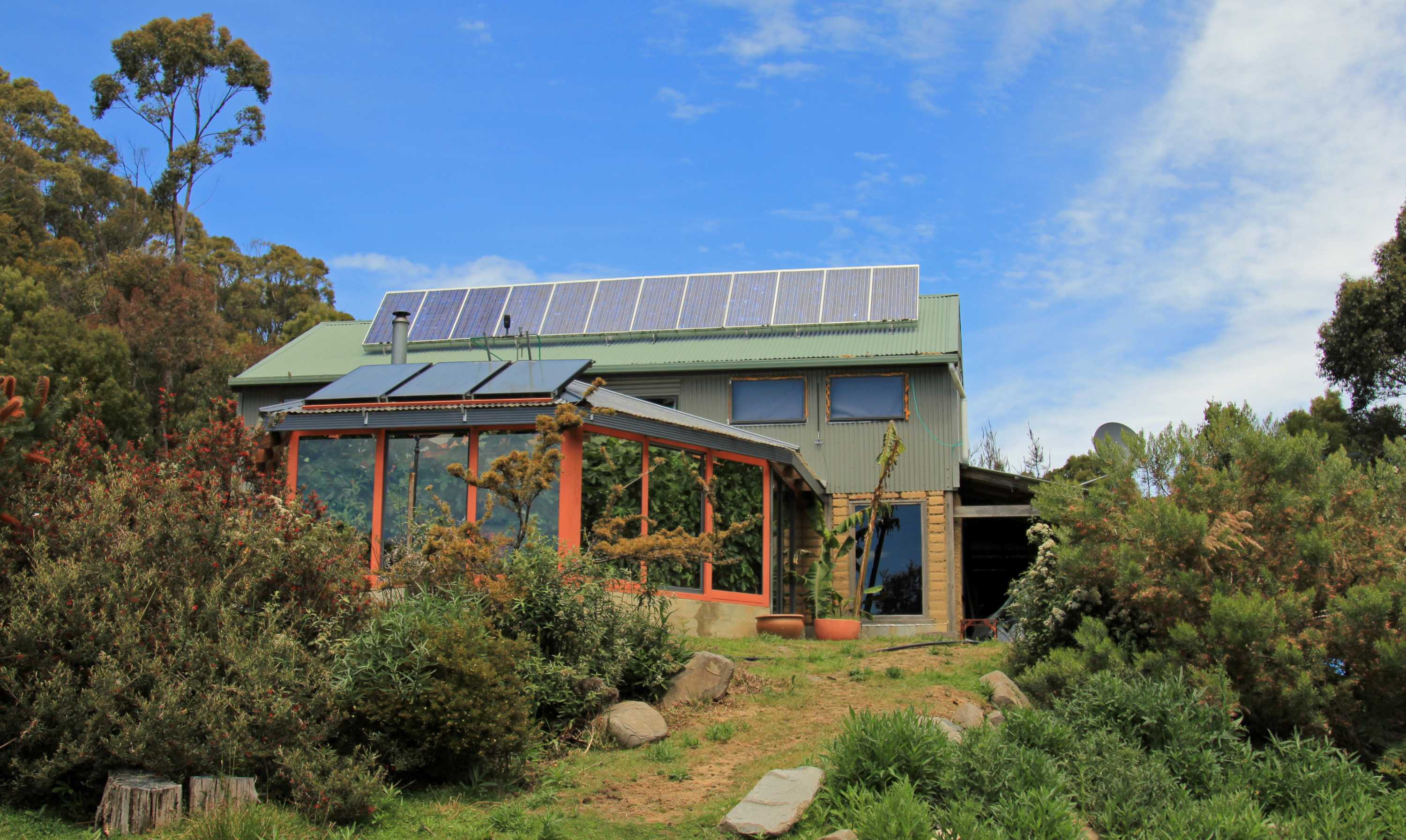 Offgrid paradise in Tasmania comes complete with grapes growing in the