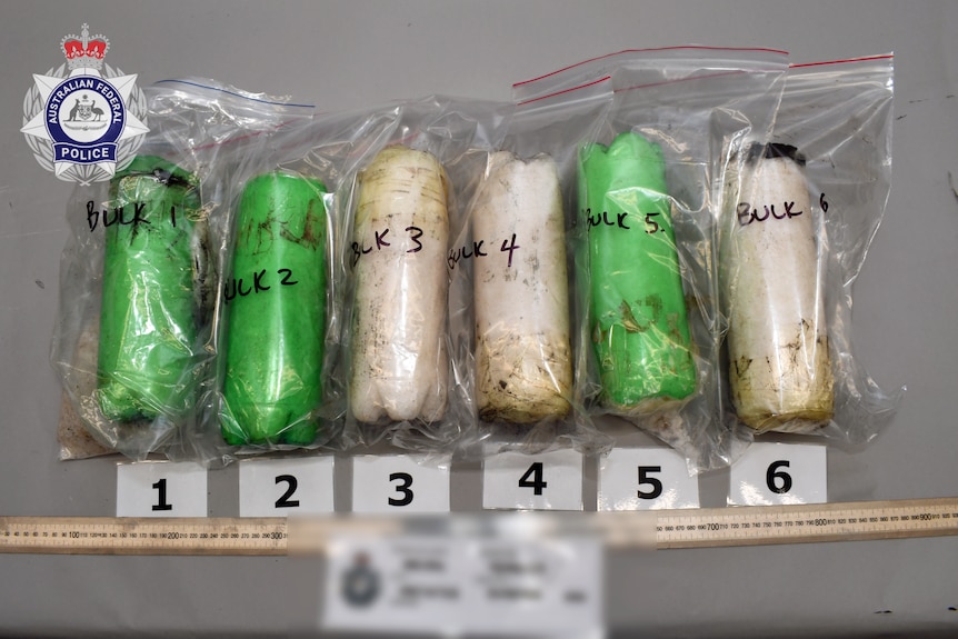 Seized methamphetamine on an evidence table