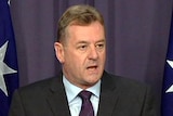 Minister for Small Business, Nick Sherry, announces his resignation.
