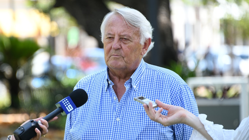 Ken Fleming talking to press in Darwin