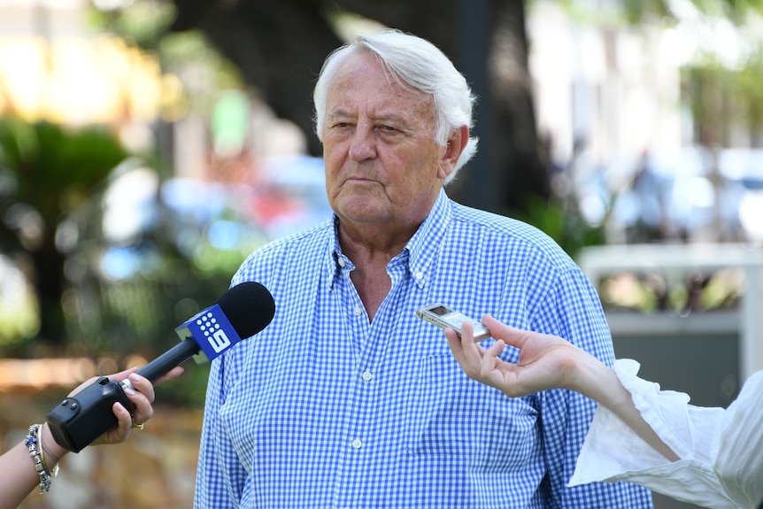 Ken Fleming talking to press in Darwin