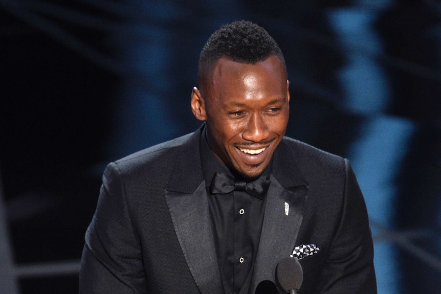 Mahershala Ali accepts the award for best actor at the Oscars.