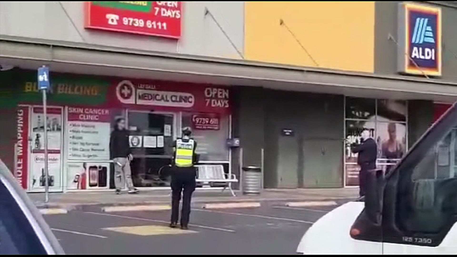 Police say officers shot man at Melbourne shopping centre after he ...