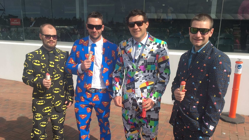 Melbourne Cup punters wear colourful suits