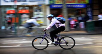 A cyclist makes his way to work in Melbourne on 'National Ride to Work Day'