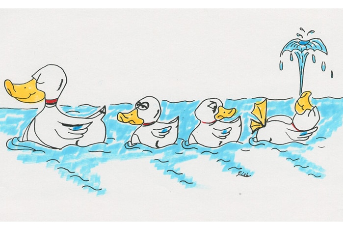 Cartoon of a row of ducklings