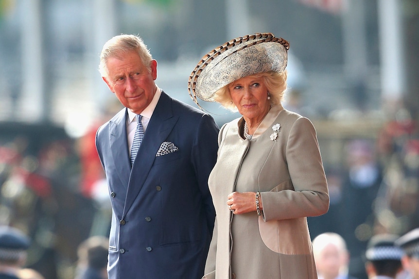  Britain's Prince Charles, left and Camilla, the Duchess of Cornwall stand, during the official ceremonial welcome