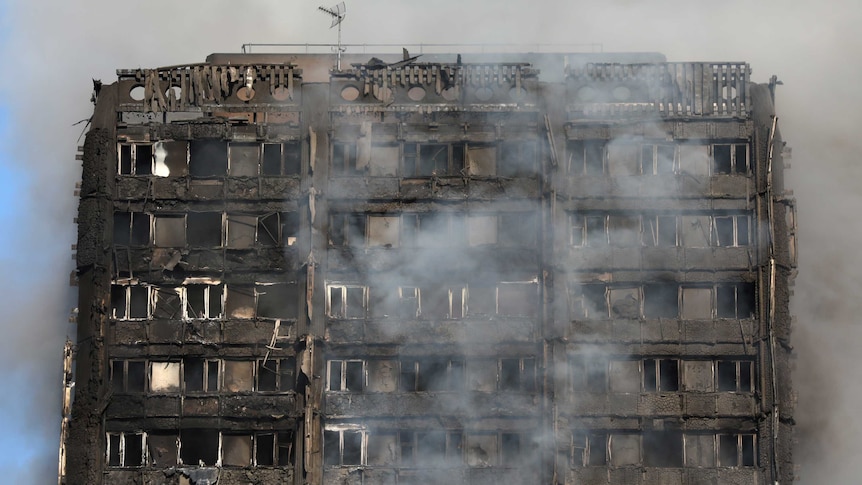Daylight reveals the extent of damage to the Grenfell Tower (Image: Reuters/Neil Hall)