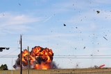 The explosion shown after a plane crashes after colliding with another during an airshow at Dallas .