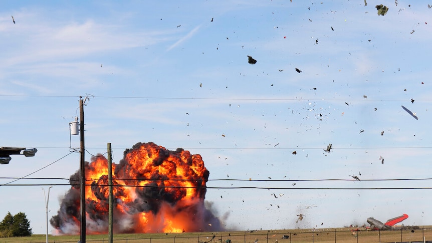 The explosion shown after a plane crashes after colliding with another during an airshow at Dallas .