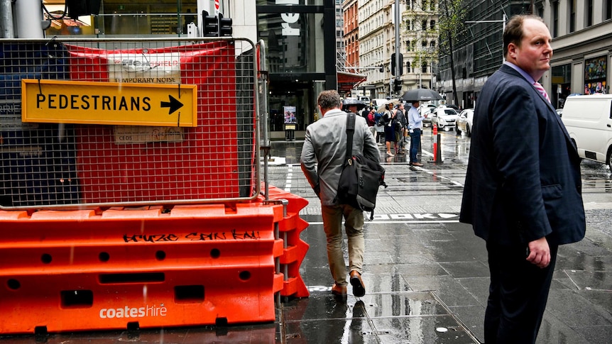 A pedestrian sign city walkers to move.