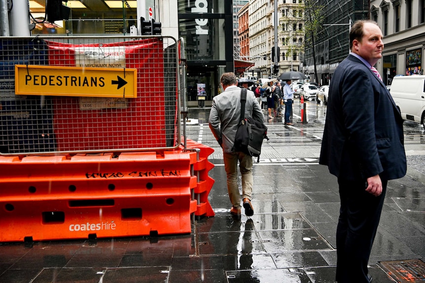 A pedestrian sign city walkers to move.