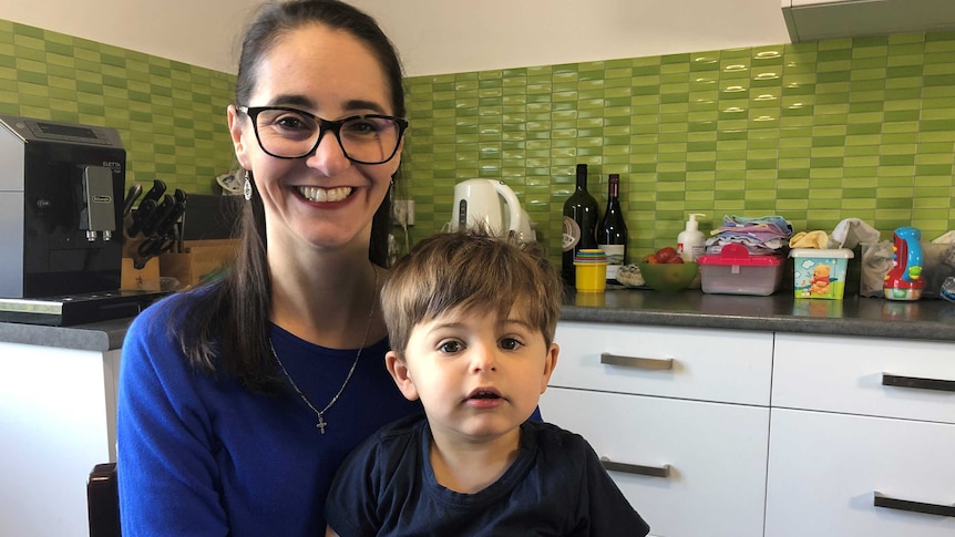 Mother Laura Laslett with her two year old son.