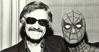 Stan Lee standing next to Spider-Man.
