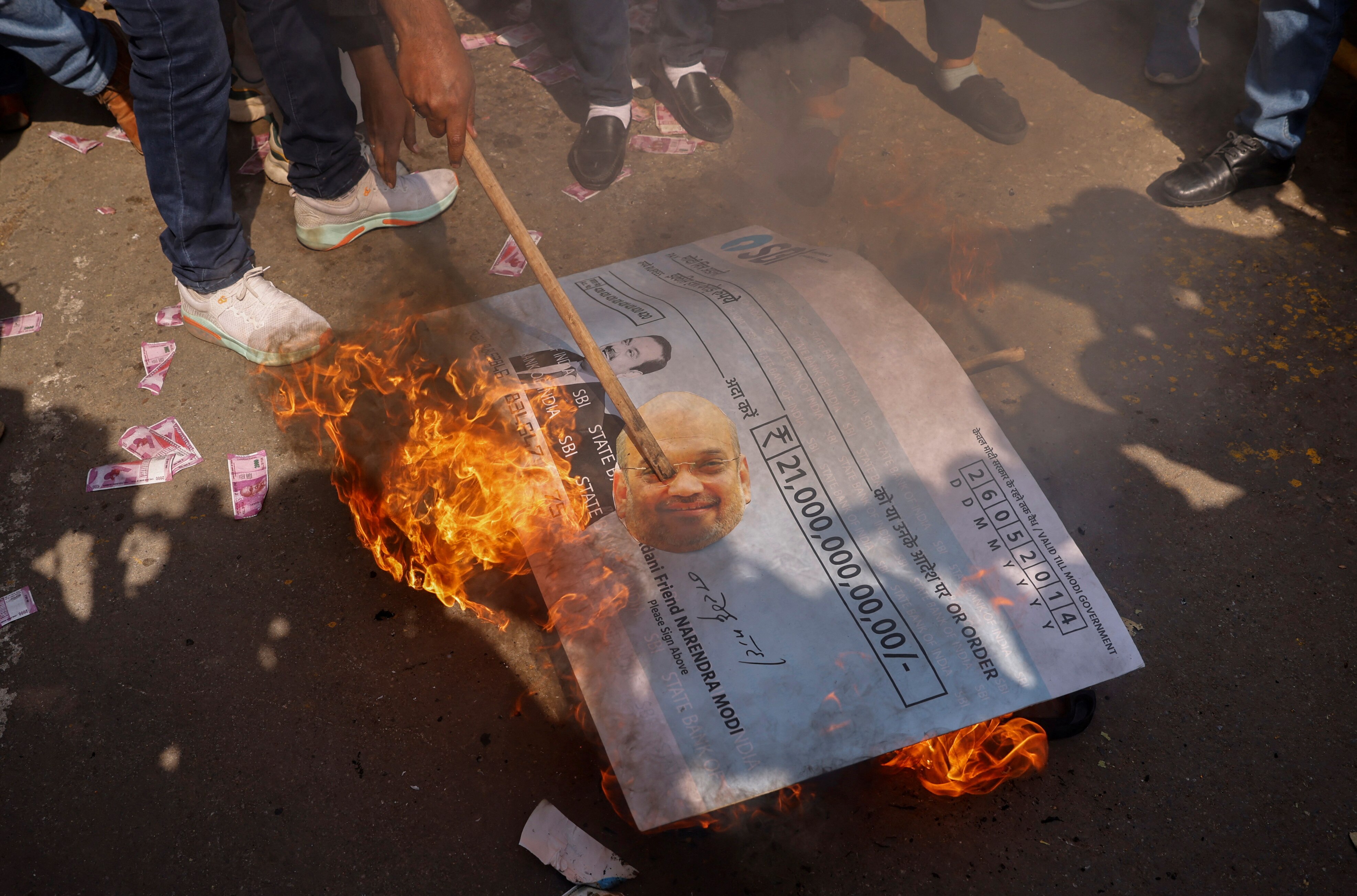 A large cheque on the ground on fire