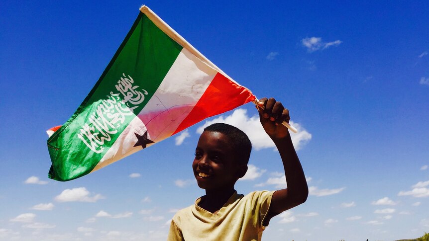 Boy waving Somaliland flag