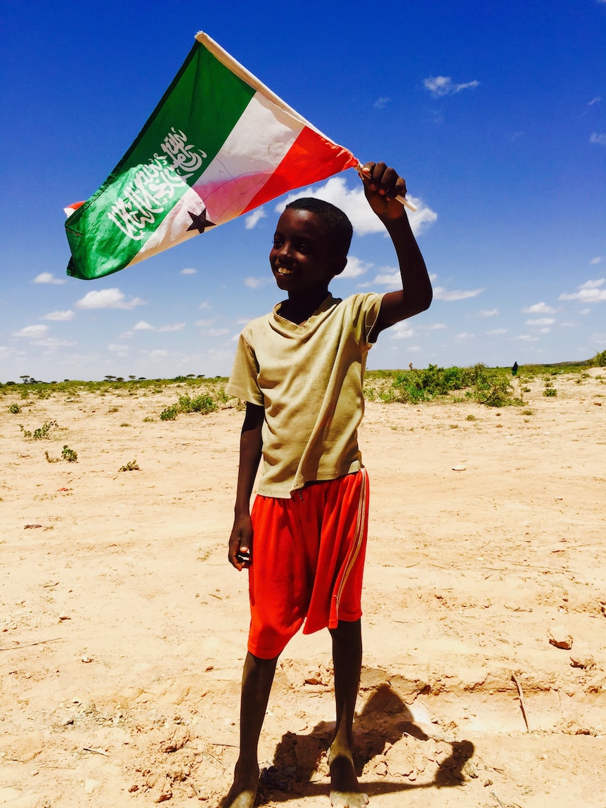 Boy waving Somaliland flag