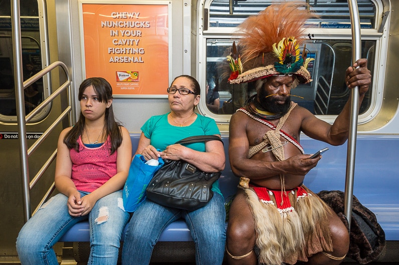 The Huli chief rides the New York City subway.