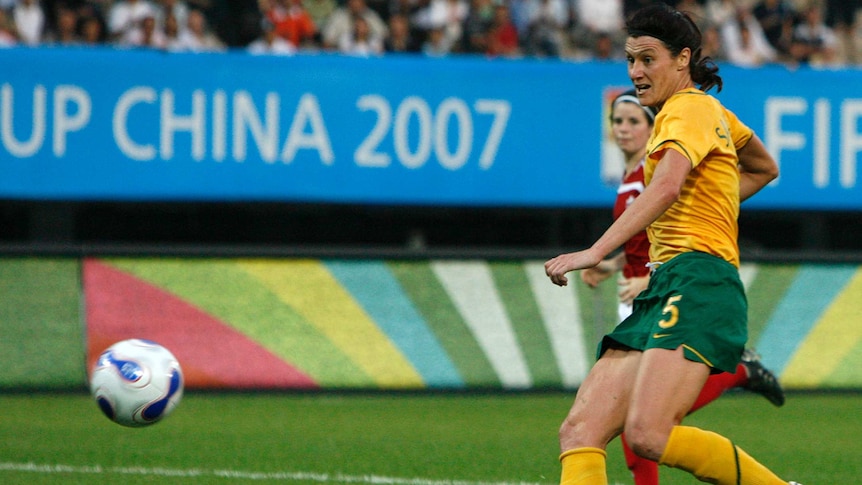 Australia's captain Cheryl Salisbury scores against Canada at the 2007 FIFA Women's World Cup.
