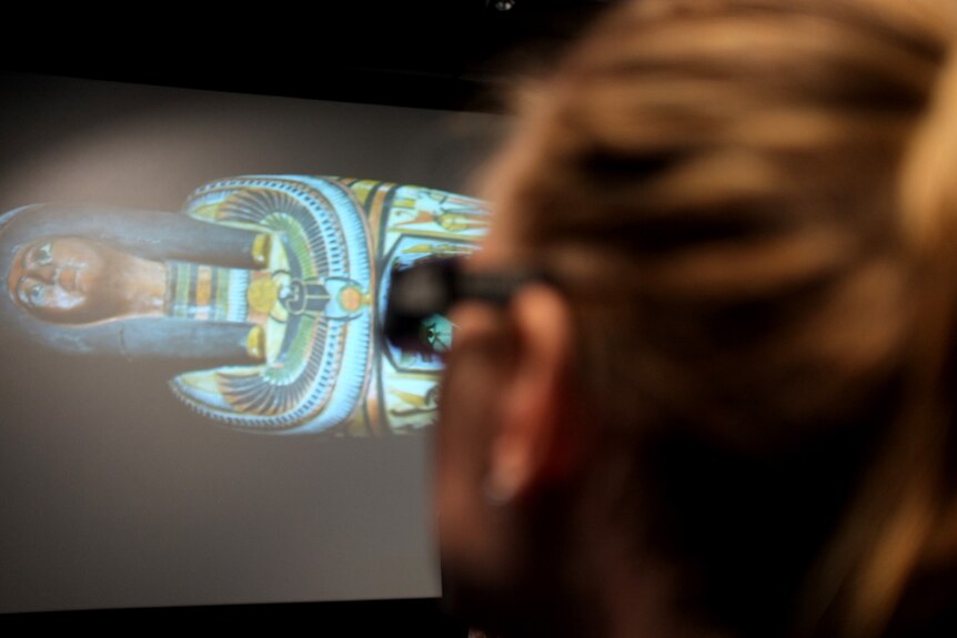 Virtually unwrapped... taking in the 3D imagery of the mummy Nesperennub at the Queensland Museum.