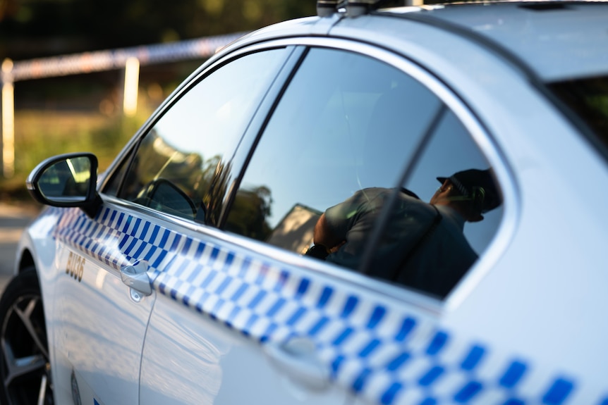 Police are seen searching for a mother and her child after a placenta was found overnight in Earlwood.