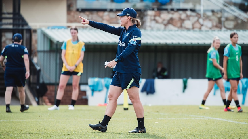 Matildas assistant coach Mel Andreatta points as she coaches her team.
