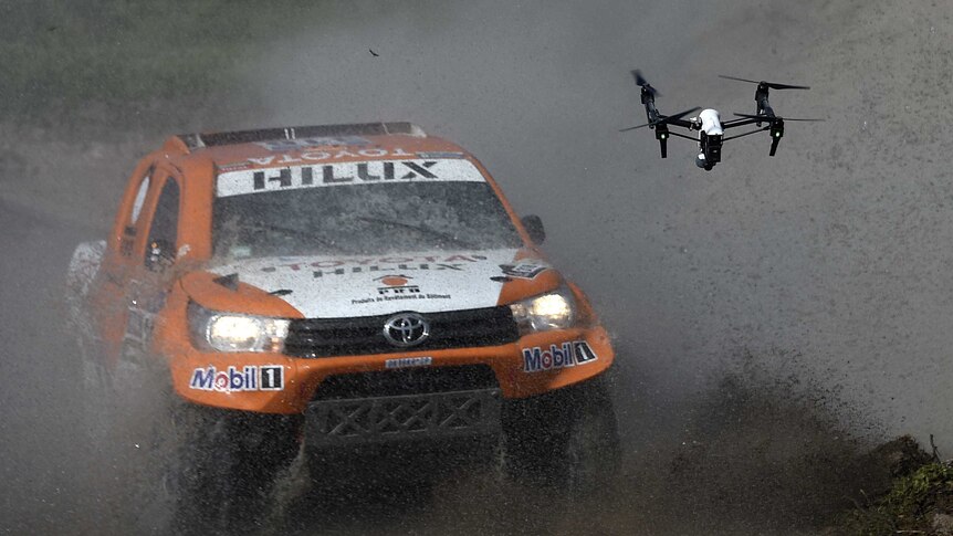 Ronan Chabot drives through water during the Dakar Rally prologue