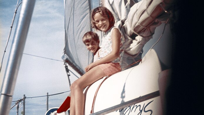 Collette Dinnigan with her brother on a boat