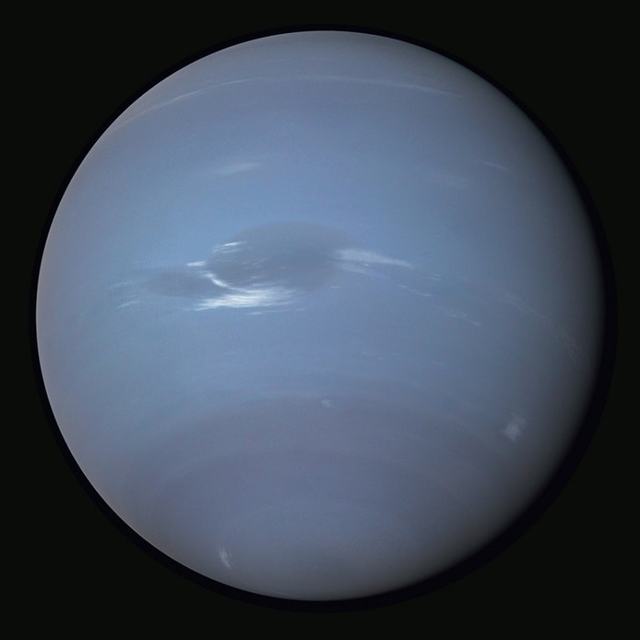 A view of Neptune, dark blue-purple in colour