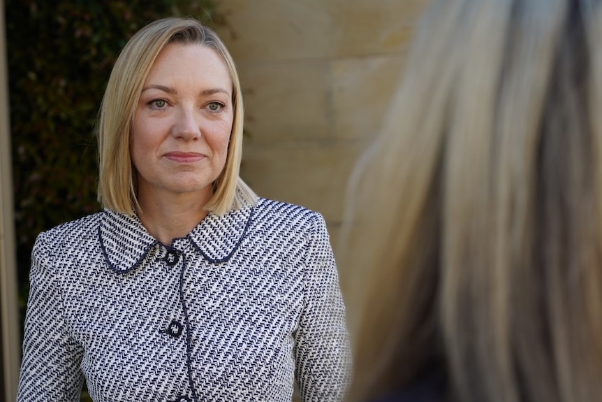 Mia Davies speaks to journalists outside Parliament House