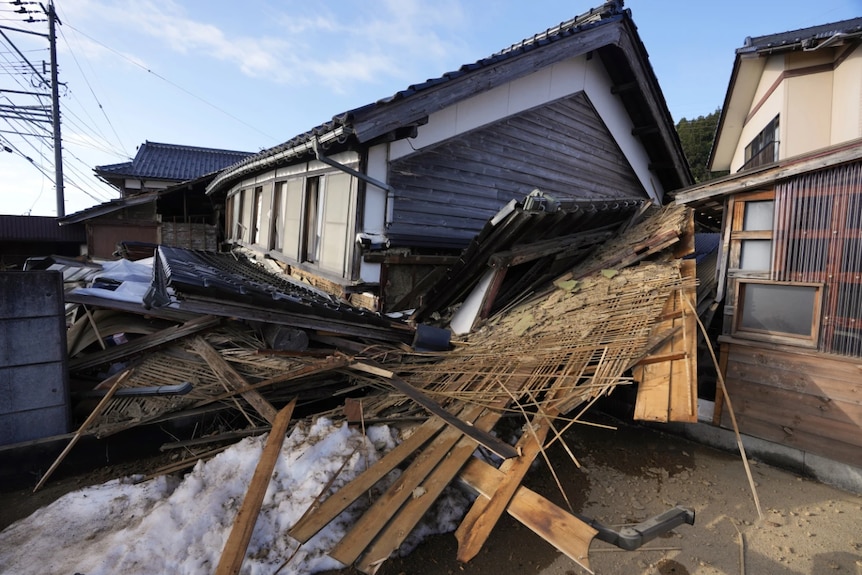 A collapsed house after an earthquake