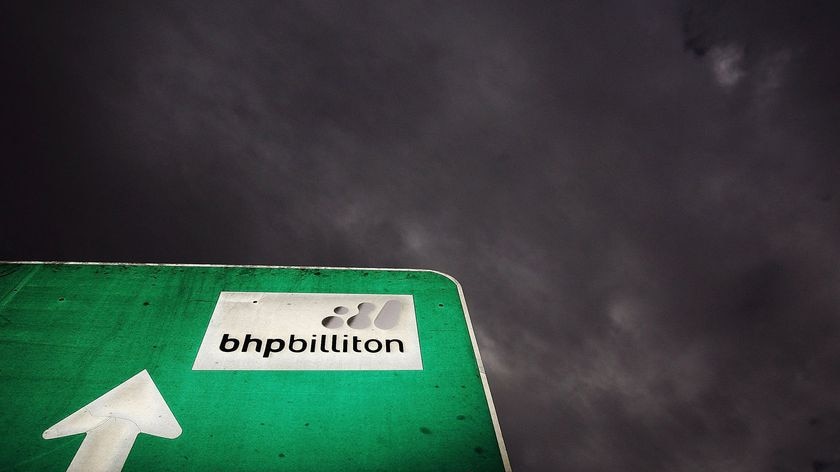 A road sign points the way to BHP Billiton's Mt. Arthur coal mine in Muswellbrook, New South Wales