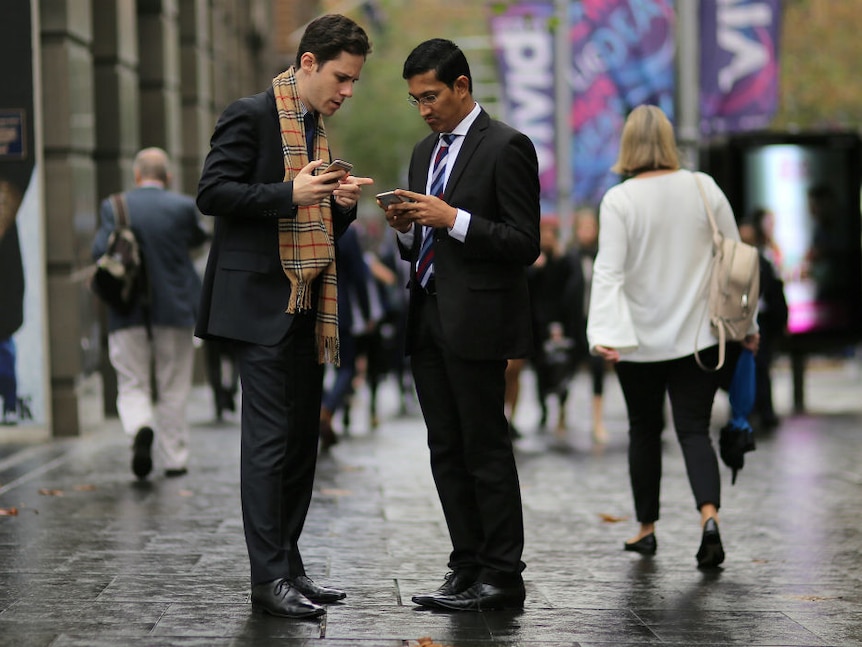 Generic businessmen in suits by Reuters