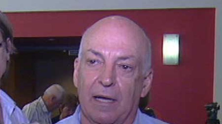 TV still of Emmanuel Cassimatis, founder of former Townsville-based company, Storm Financial,