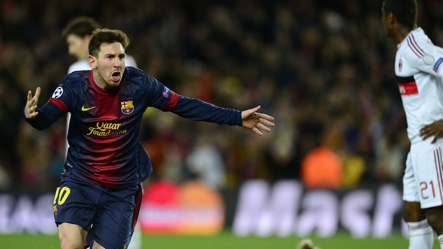 Lionel Messi celebrates scoring a goal for Barcelona in the Champions League against AC Milan.