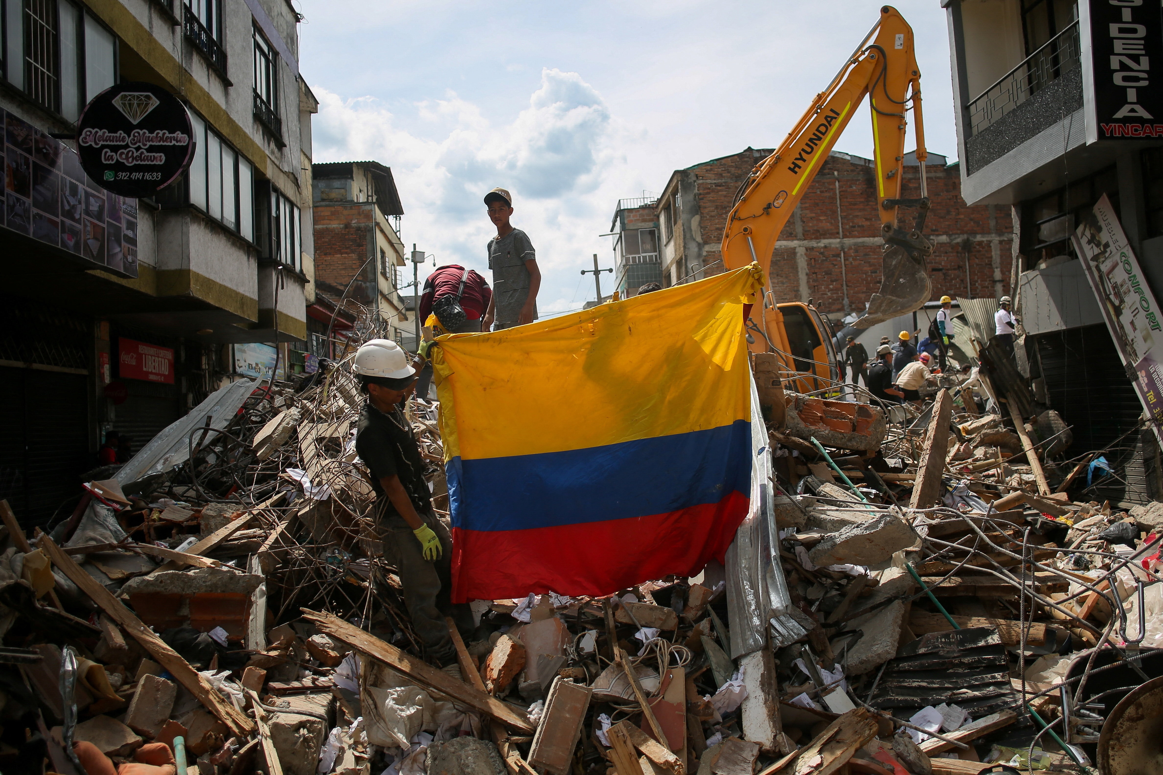 Colombia survivors reflect on quake terror as rescuers search rubble
