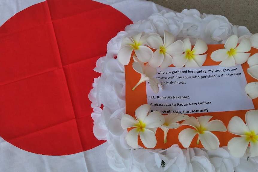 The Japanese Embassy's note pictured along with the flowers saying thoughts and prayers are with those who lost their lives.