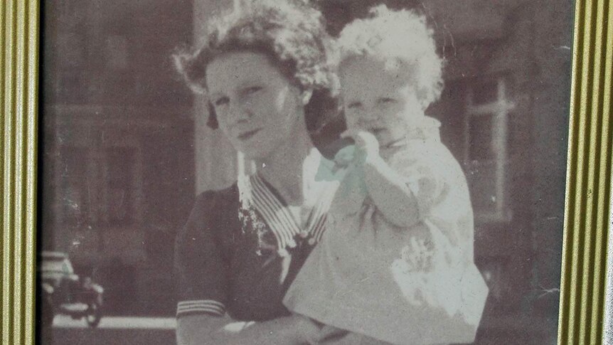 An early photograph of Val Hough holding her oldest son Ron