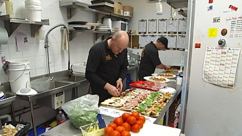 Canberra catering company preparing nibbles for Melbourne Cup Day in their kitchen