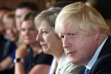 Boris Johnson sits beside Theresa May at a cabinet meeting in 2016.